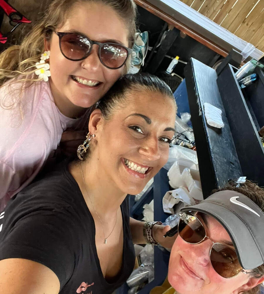 The Point Restaurant crew taking a selfie behind the Courtyard bar in Perdido, FL