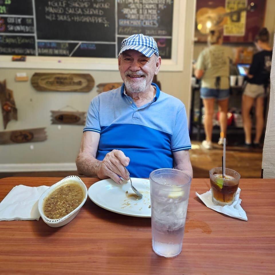 Guest enjoying a bowl of gumbo in the dining room at The Point Restaurant Perdido